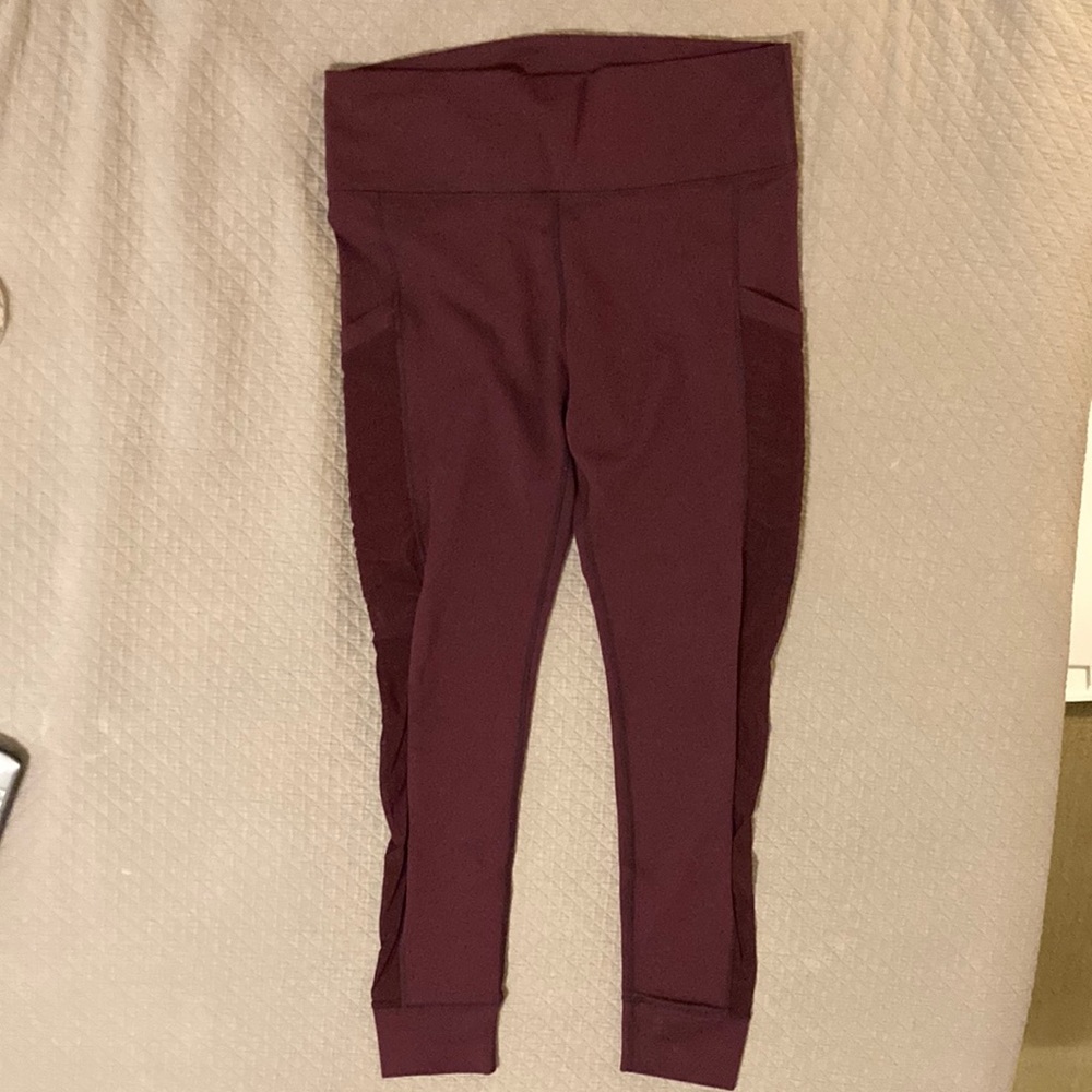 Fabletics leggings purple with pockets and mesh detail